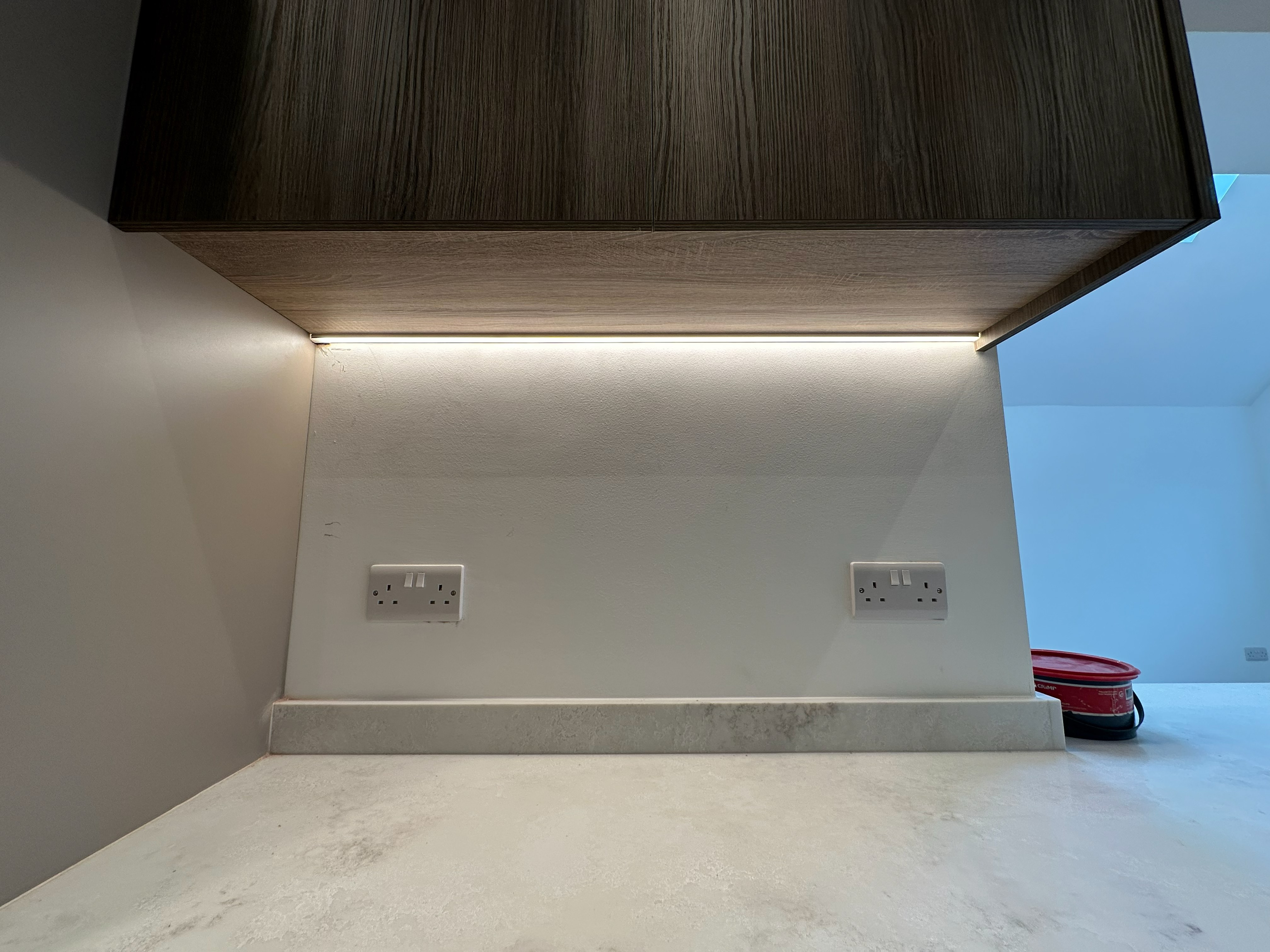 Under cabinet LED strip lighting